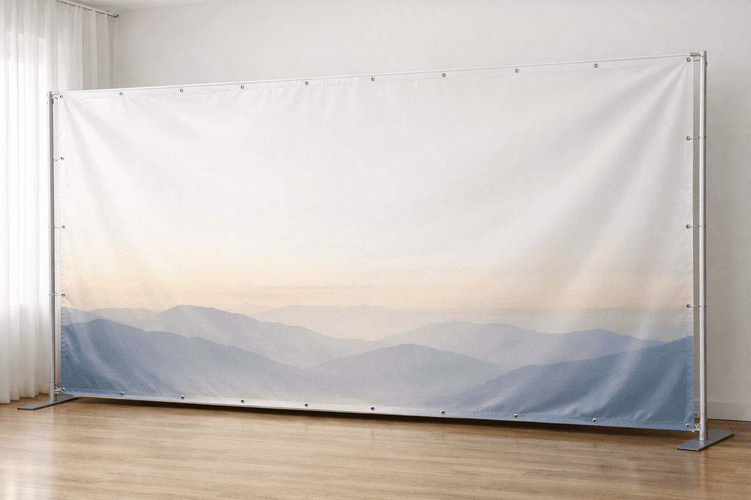 Wide vinyl banner used as a simple event backdrop in a bright room